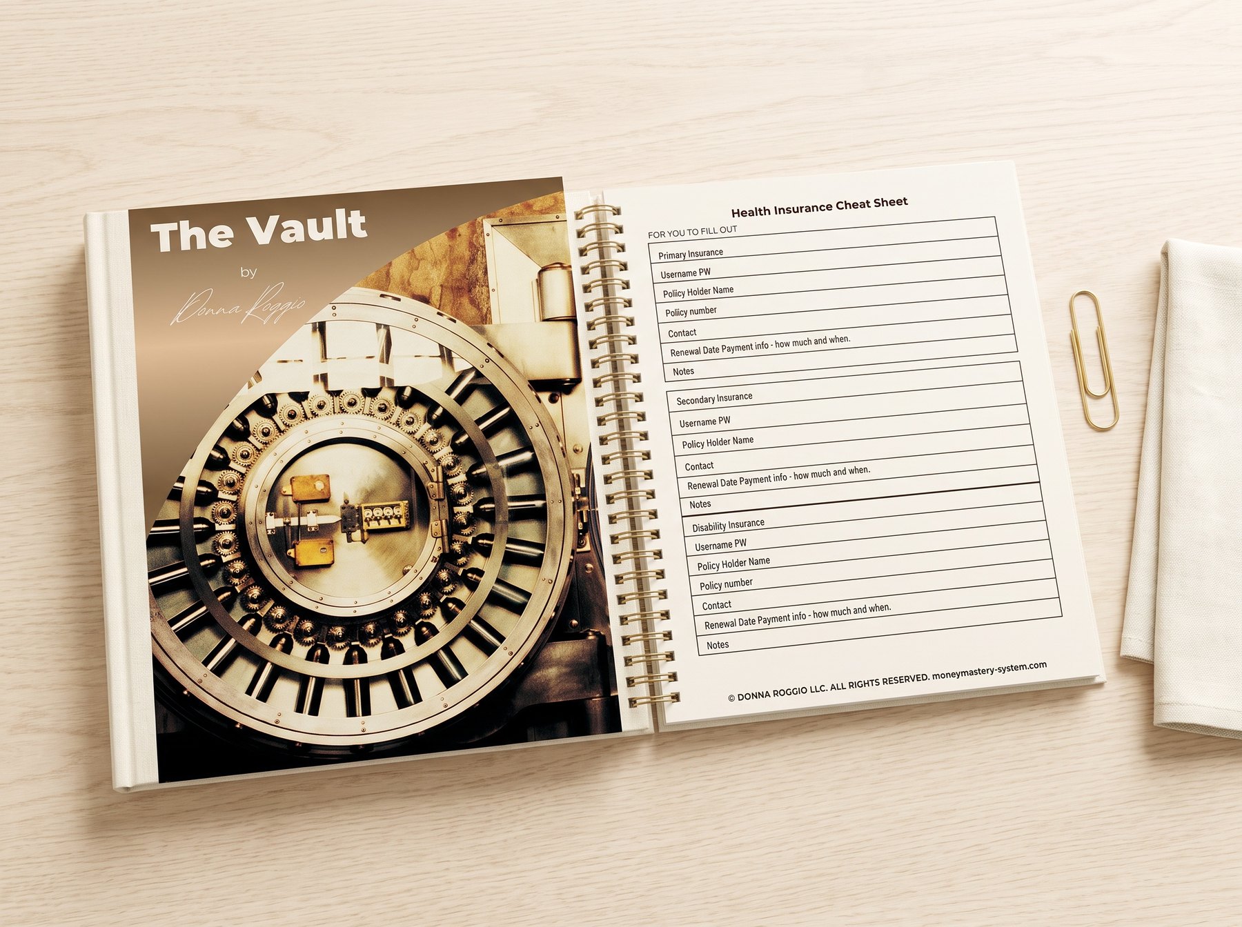 The Vault open on a bright oak desk, Health Insurance Cheat Sheet visible